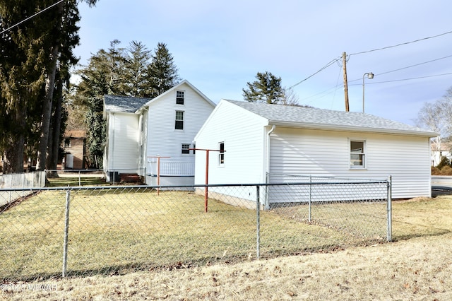 view of property exterior with a lawn