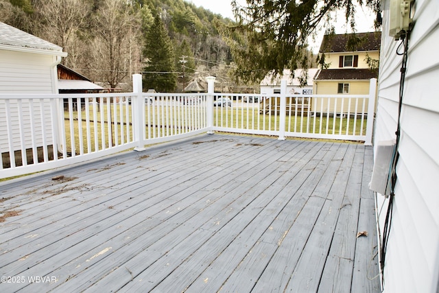 deck featuring a lawn