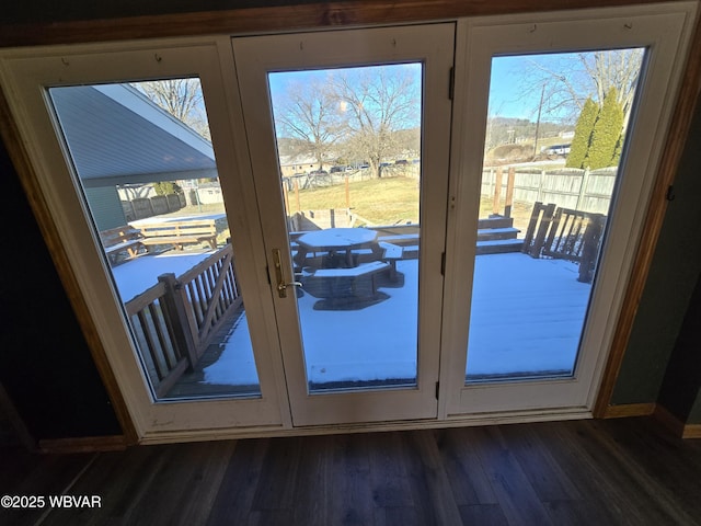 doorway featuring french doors and dark wood-type flooring