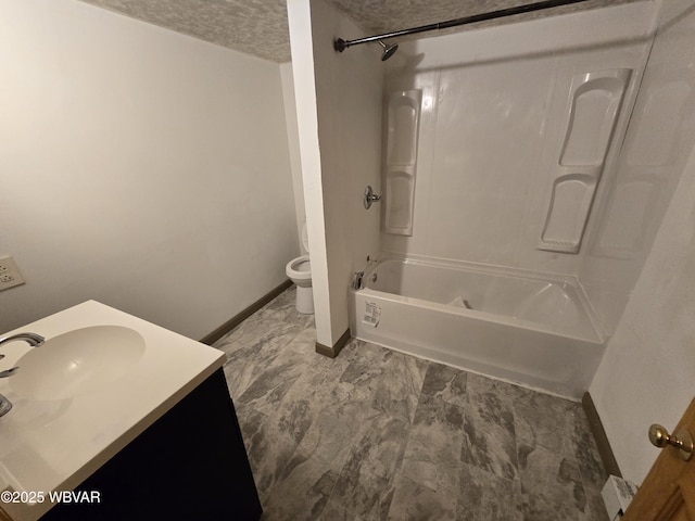 full bathroom with bathing tub / shower combination, vanity, a textured ceiling, and toilet