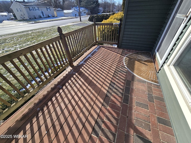 wooden deck featuring covered porch