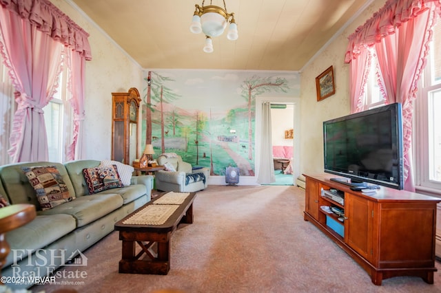 carpeted living room featuring a chandelier