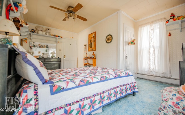 carpeted bedroom featuring ceiling fan, a baseboard radiator, and ornamental molding