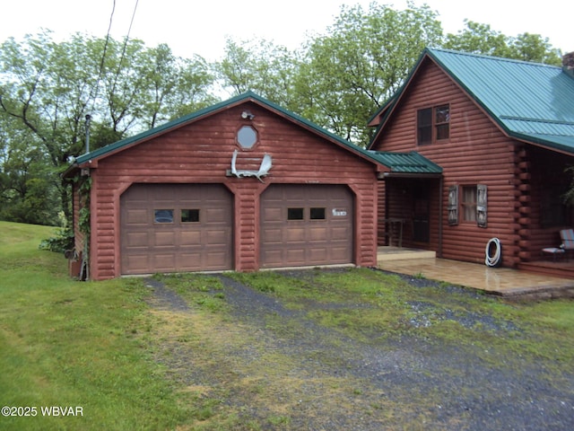 70 Berry Ln, Mill Hall, PA 17751 - view of front of house with asphalt driveway, an attached garage, metal roof, and log siding