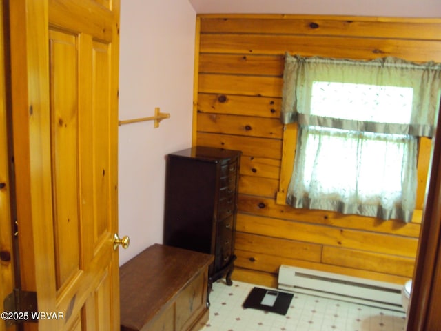 70 Berry Ln, Mill Hall, PA 17751 - bedroom with a baseboard radiator, light floors, and wooden walls