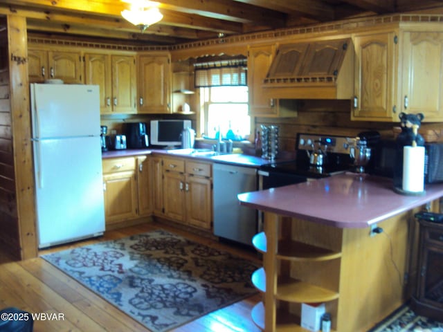 70 Berry Ln, Mill Hall, PA 17751 - kitchen with freestanding refrigerator, custom exhaust hood, dishwasher, open shelves, and a peninsula