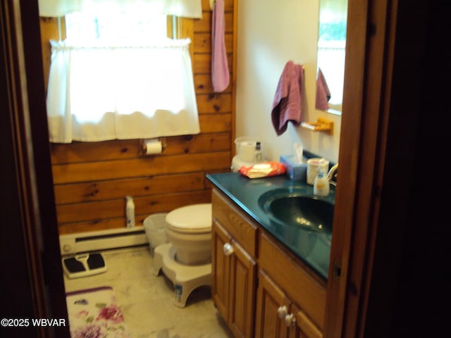 70 Berry Ln, Mill Hall, PA 17751 - bathroom with baseboard heating, toilet, and vanity