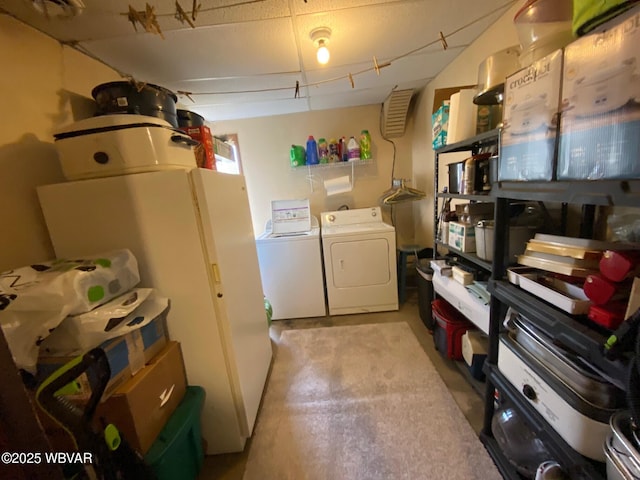 laundry room with washing machine and dryer and laundry area