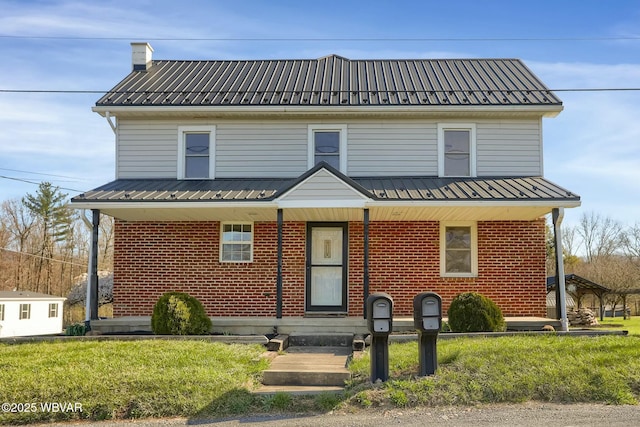 1195 Alvira Rd, Allenwood, PA 17810 - view of front of home featuring brick siding and metal roof