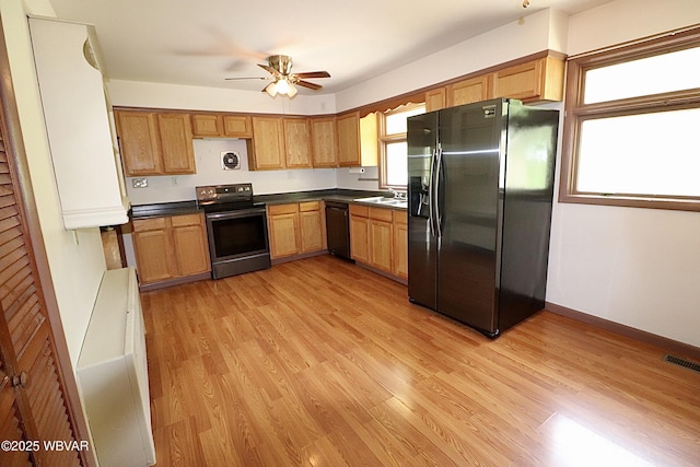1964 Poco Farm Rd, Williamsport, PA 17701 - kitchen featuring stainless steel range with electric cooktop, refrigerator with ice dispenser, dishwasher, and light wood finished floors