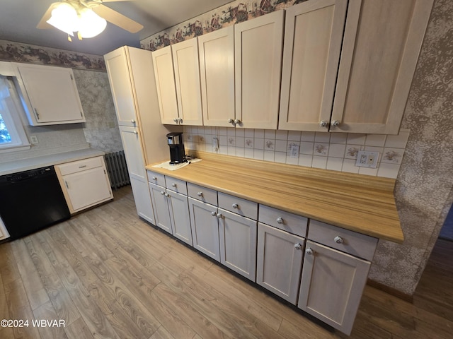 kitchen with ceiling fan, black dishwasher, tasteful backsplash, gray cabinets, and light wood-type flooring