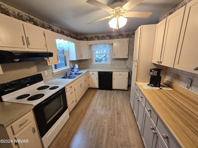 kitchen featuring electric range, white cabinets, black dishwasher, and light hardwood / wood-style flooring