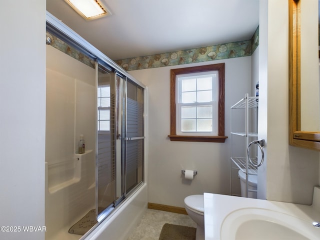 full bathroom with vanity, toilet, and enclosed tub / shower combo