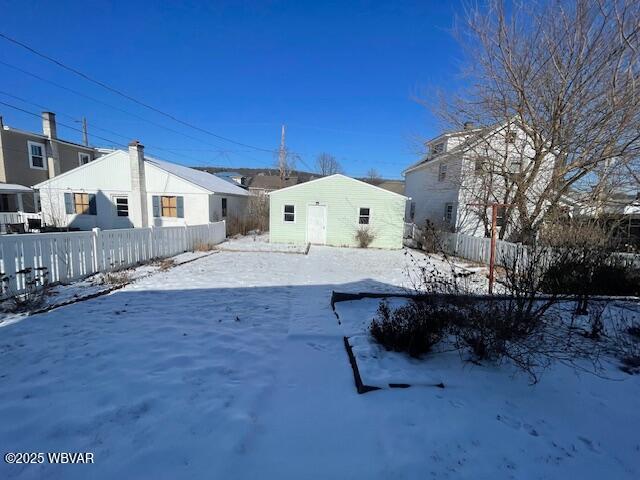 view of snow covered house