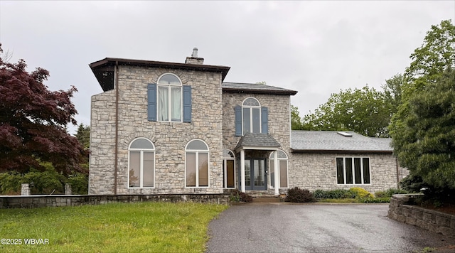 1290 Windfield Dr, Williamsport, PA 17701 - view of front facade with stone siding, a chimney, and french doors