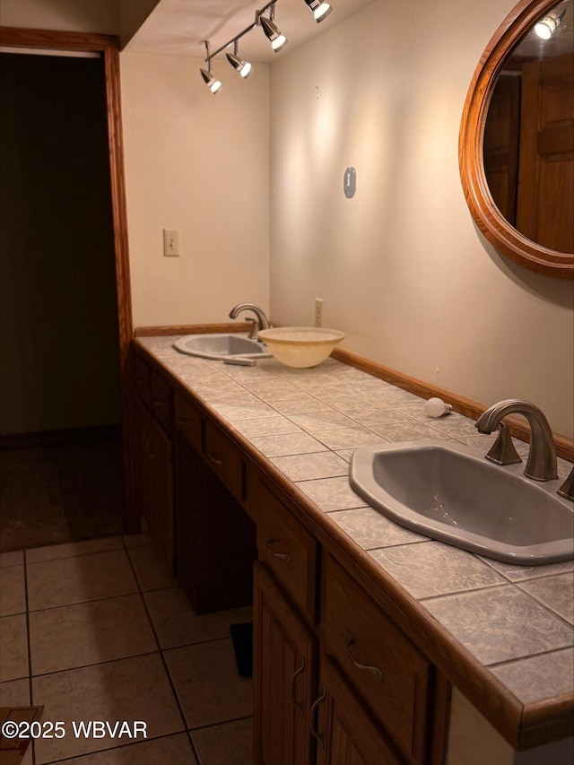 1290 Windfield Dr, Williamsport, PA 17701 - bathroom featuring rail lighting, tile patterned flooring, and double vanity