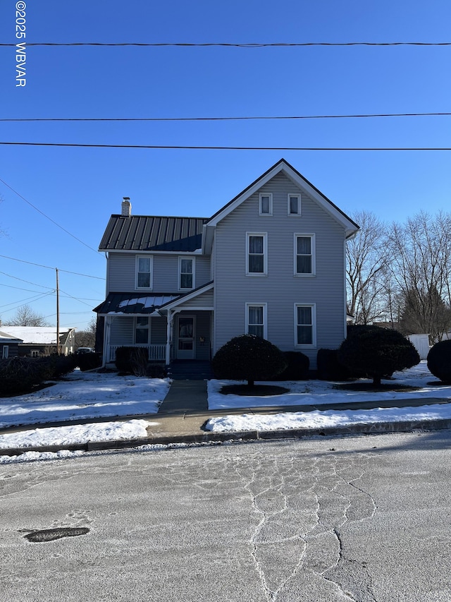 view of front property featuring a porch