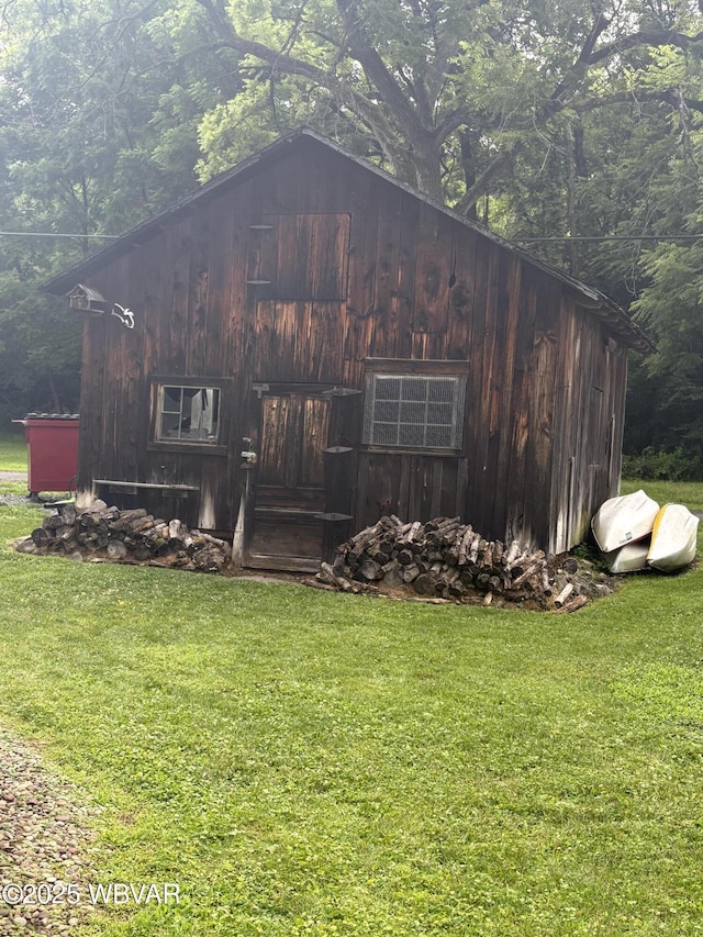 433 S Main St, Jersey Shore, PA 17740 - view of front of property featuring a front lawn, a barn, and an outbuilding