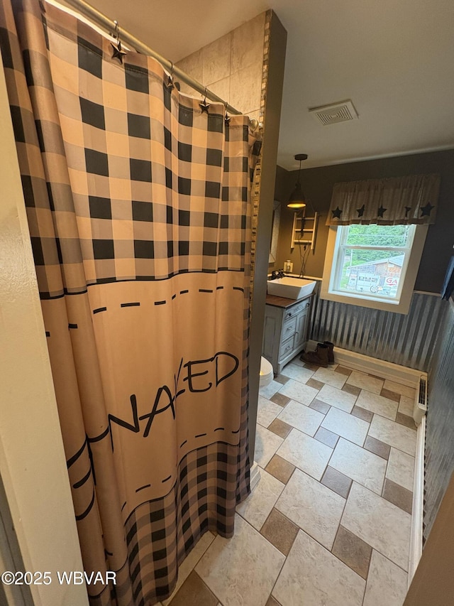 433 S Main St, Jersey Shore, PA 17740 - bathroom featuring vanity and curtained shower