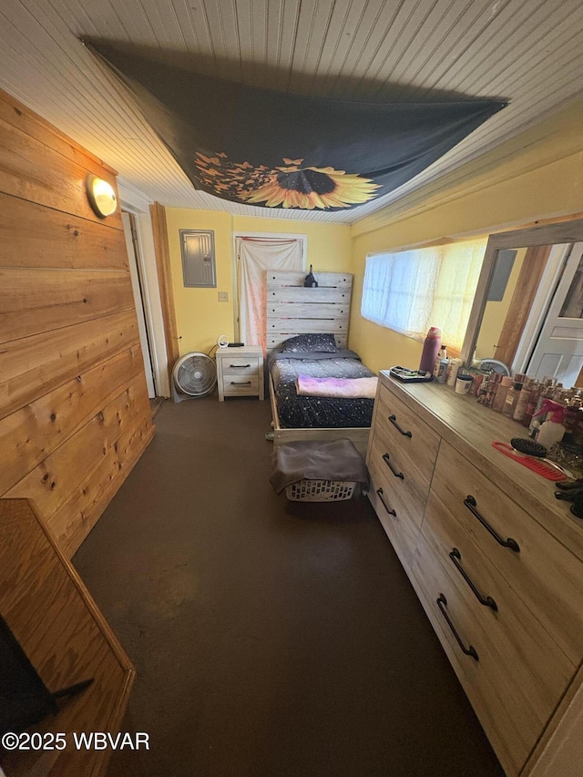 433 S Main St, Jersey Shore, PA 17740 - bedroom featuring dark colored carpet, wooden walls, and wooden ceiling