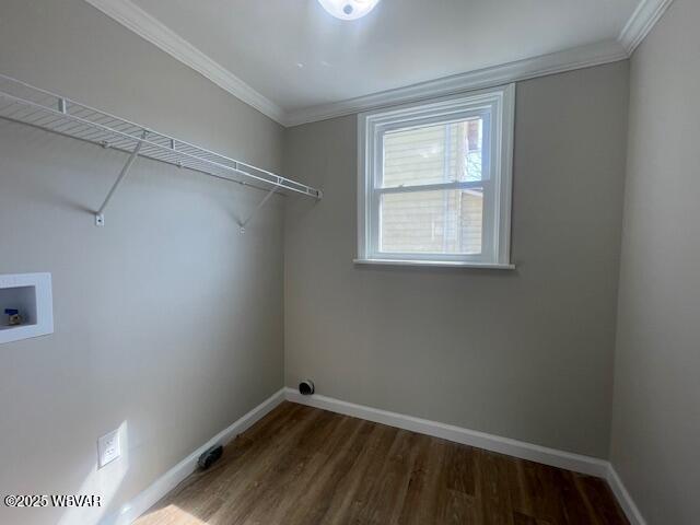 laundry room featuring baseboards, hookup for a washing machine, laundry area, and ornamental molding