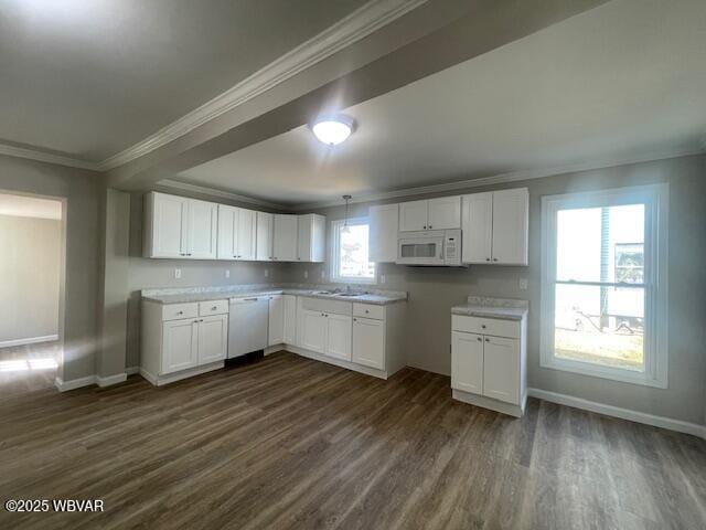 kitchen with baseboards, ornamental molding, white cabinets, white appliances, and dark wood-style flooring