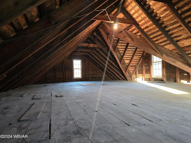 unfinished attic with plenty of natural light