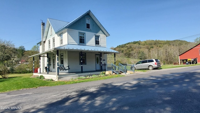 farmhouse with covered porch