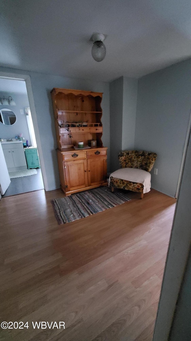 unfurnished room with hardwood / wood-style flooring