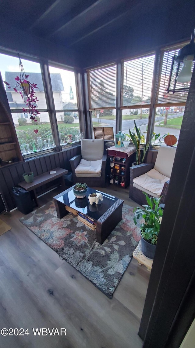 sunroom / solarium featuring plenty of natural light