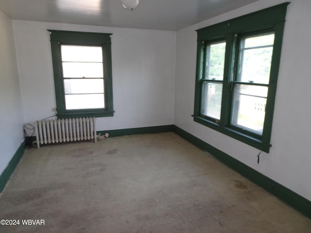 5047 Blockhouse Rd, Liberty, PA 16930 - carpeted spare room featuring radiator heating unit and baseboards