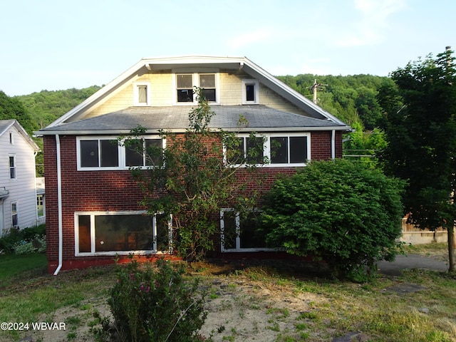 5047 Blockhouse Rd, Liberty, PA 16930 - back of house with brick siding and a shingled roof