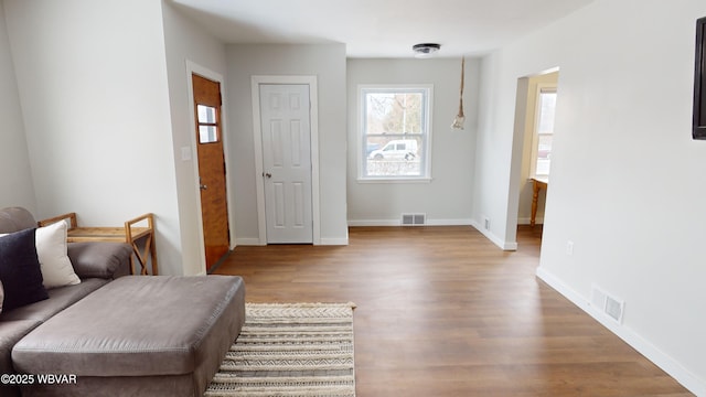 living area featuring hardwood / wood-style flooring