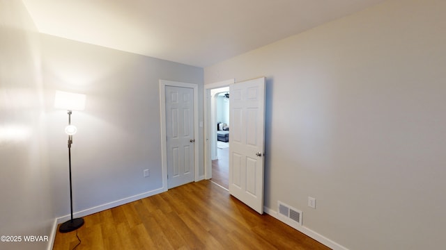 unfurnished bedroom with light hardwood / wood-style flooring