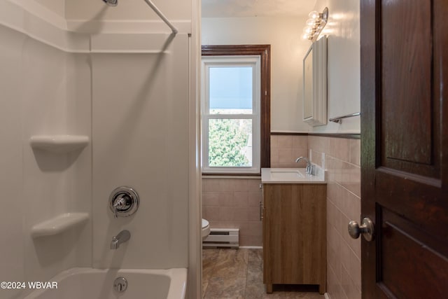 full bathroom featuring a baseboard radiator, tile walls, toilet, vanity, and shower / bathtub combination