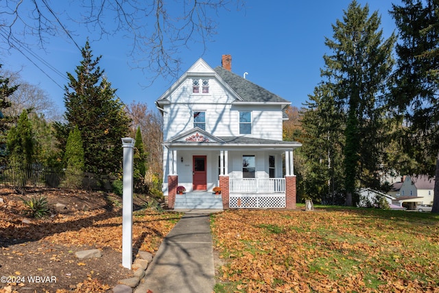 victorian-style house with a porch