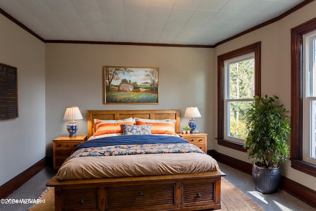 bedroom with carpet flooring and crown molding