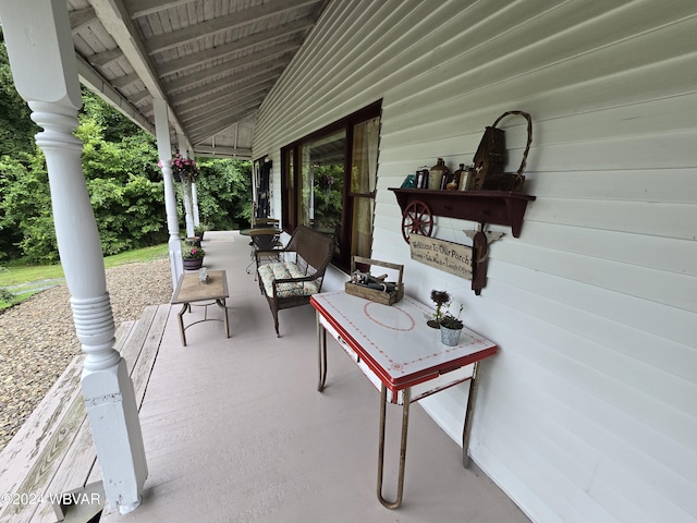 view of patio featuring a porch