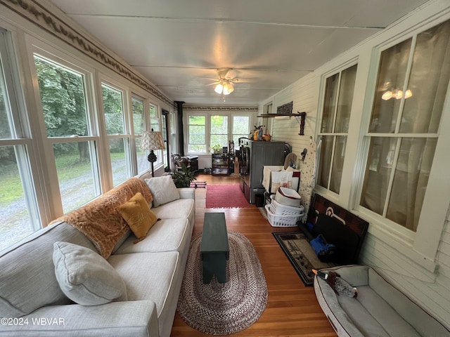 sunroom / solarium with ceiling fan