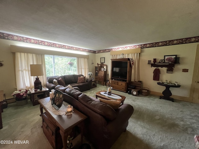 living room featuring carpet floors and a textured ceiling