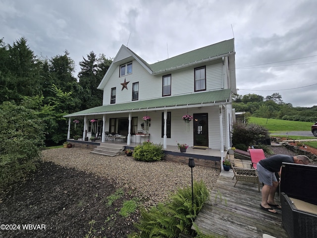 farmhouse-style home with a porch