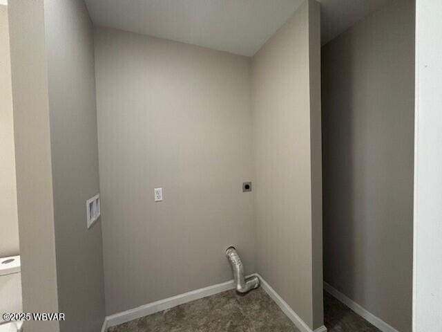 washroom featuring baseboards, hookup for an electric dryer, and laundry area