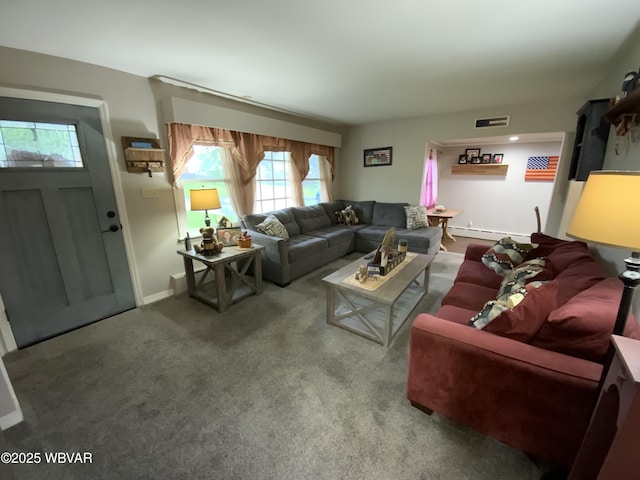 699 James St, Lock Haven, PA 17745 - living room featuring carpet flooring, a baseboard heating unit, and baseboards