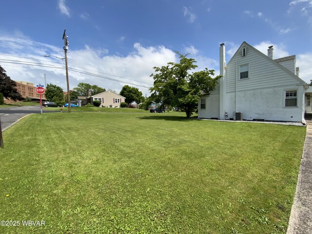 699 James St, Lock Haven, PA 17745 - view of grassy yard featuring central air condition unit