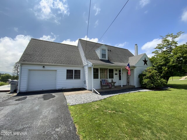 699 James St, Lock Haven, PA 17745 - cape cod house with covered porch, a garage, a front lawn, driveway, and a shingled roof