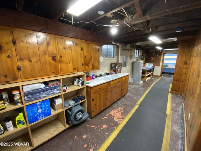 699 James St, Lock Haven, PA 17745 - basement featuring a sink and electric panel
