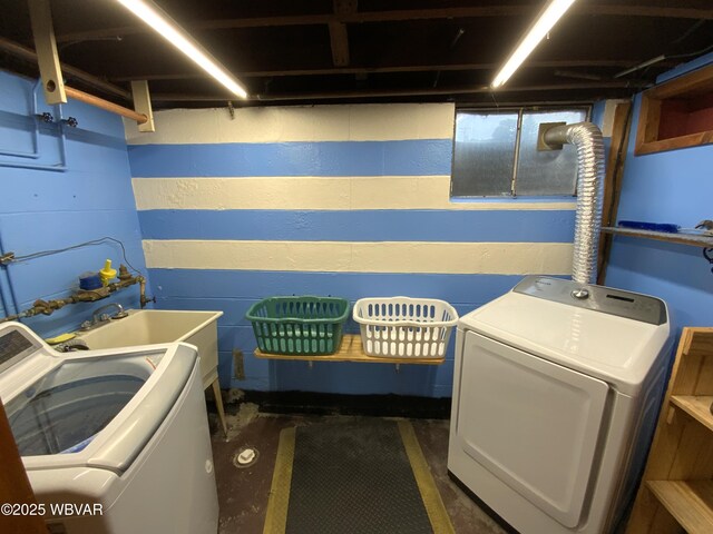 699 James St, Lock Haven, PA 17745 - washroom featuring washer and dryer and concrete block wall