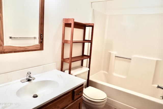 full bathroom with vanity, shower / bath combination, and toilet