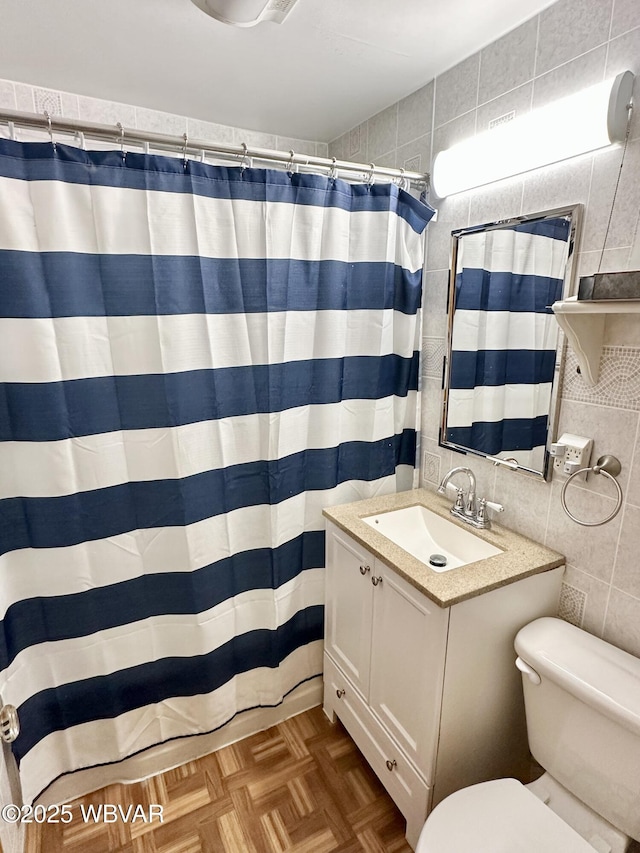 1420 Richards Ave, Williamsport, PA 17701 - bathroom with tile walls, vanity, and a shower with shower curtain