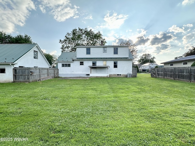 1420 Richards Ave, Williamsport, PA 17701 - back of house with a fenced backyard and a metal roof